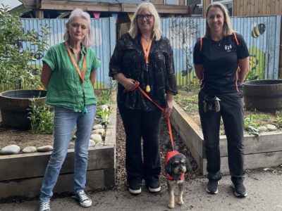 Justine roddan with buddy as they passed the dog mentoring programme