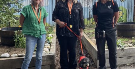 Justine roddan with buddy as they passed the dog mentoring programme