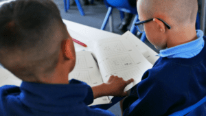 pupils helping each other in maths at rosherville academy