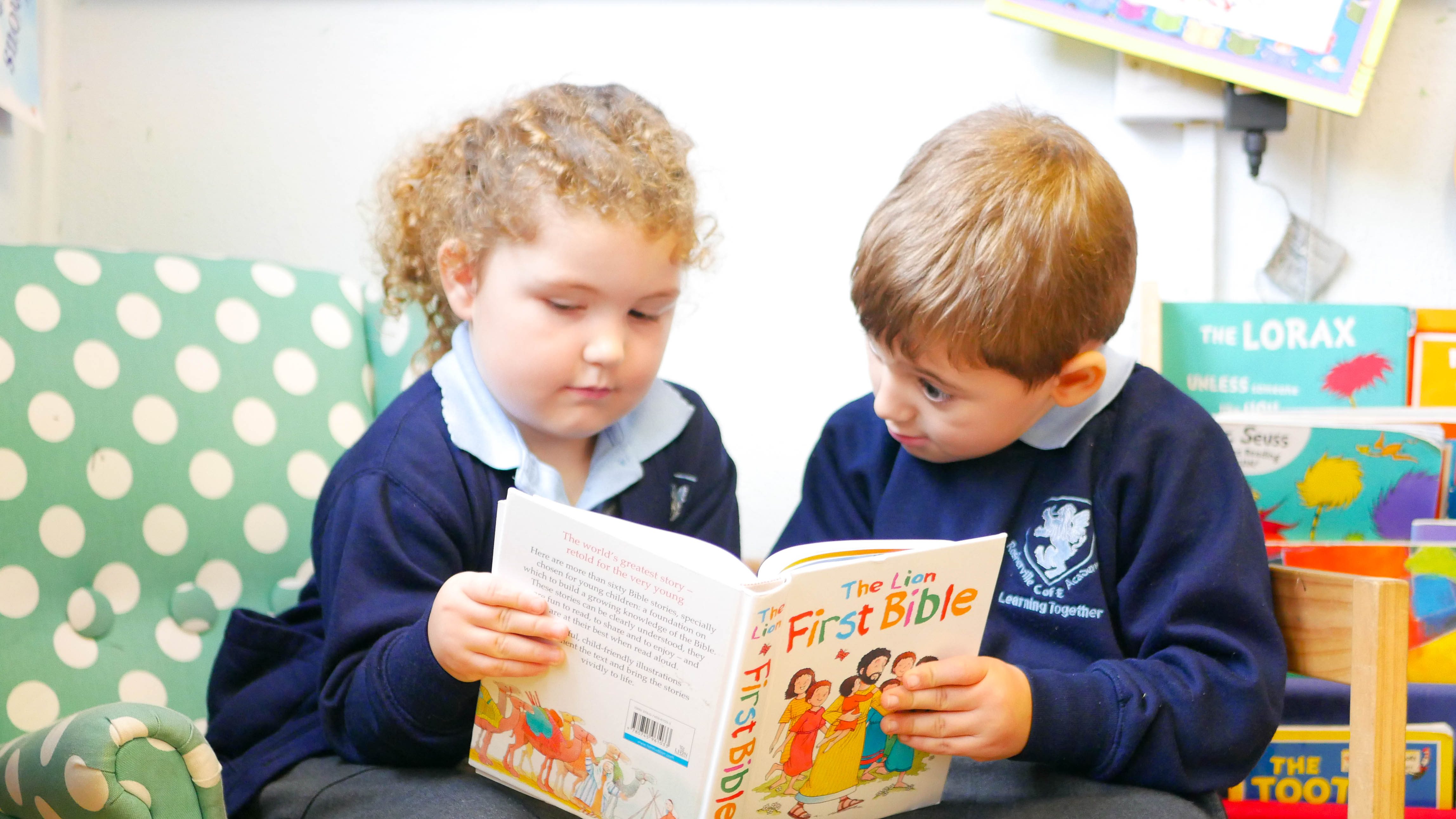 P1200478 children in EYFS reading the bible in RE at rosherville academy