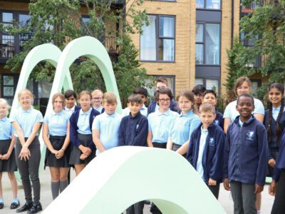 Gorup of Rosherville pupils inside light green metal art scultpure
