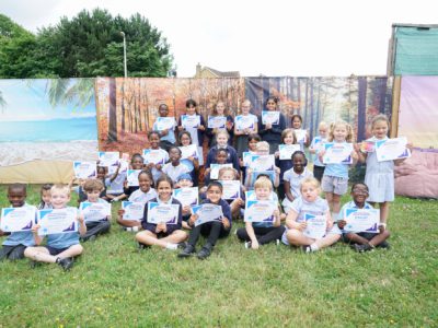 Group of pupils from every year group representing Rosherville at Darent Valley Hospital for the NHS 75th Birthday Artwork Competition.