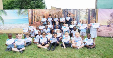 Group of pupils from every year group representing Rosherville at Darent Valley Hospital for the NHS 75th Birthday Artwork Competition.