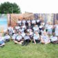 Group of pupils from every year group representing Rosherville at Darent Valley Hospital for the NHS 75th Birthday Artwork Competition.